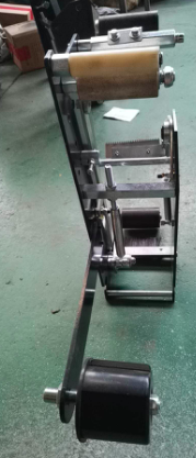 自动封箱机机芯-带头加长贴带器